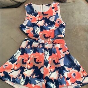 Romper with cut out at the waist, floral